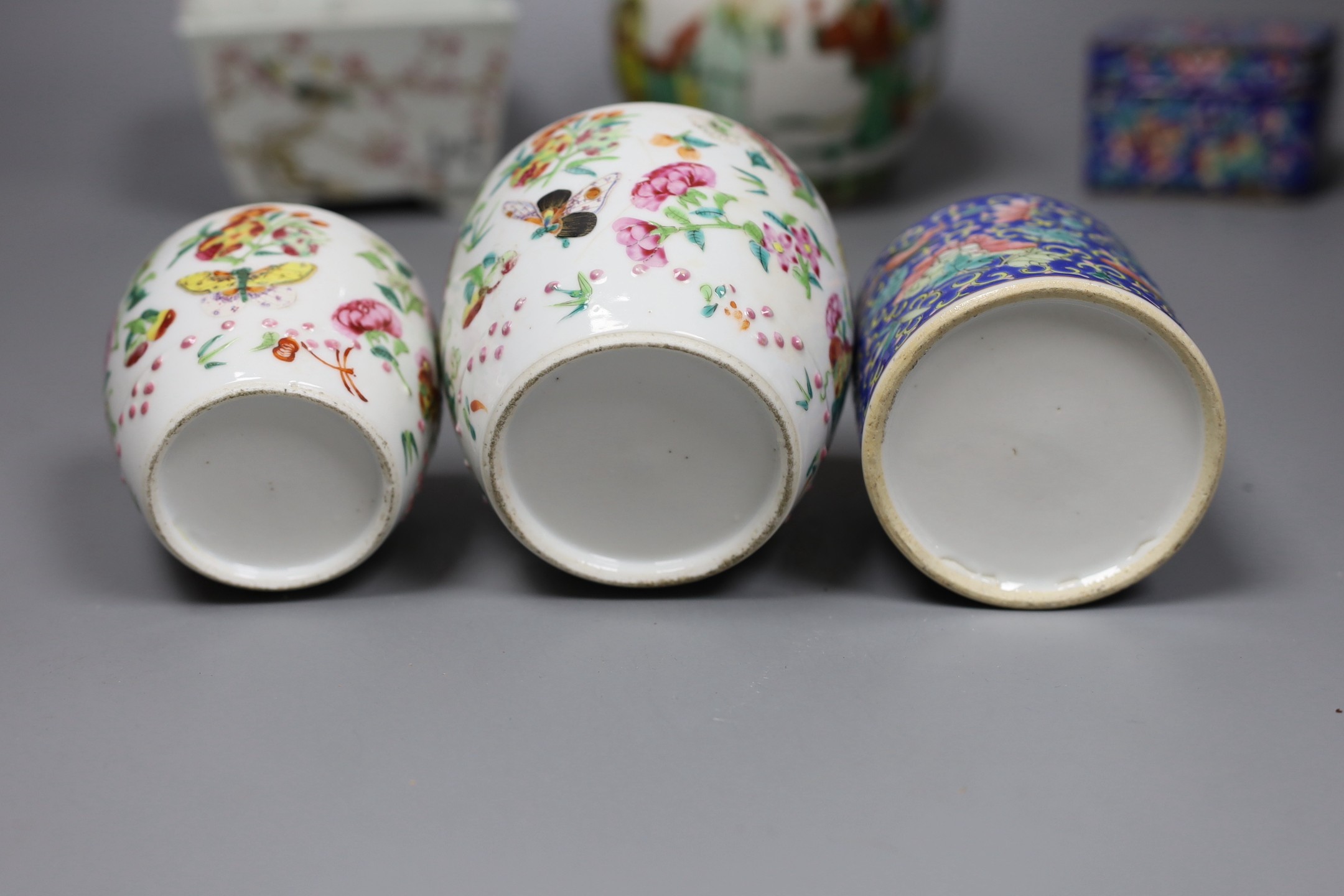 A Chinese famille verte ginger jar, together with three famille rose ceramics, a blue enamel box and cover, and a Chinese blue polychrome box (6)